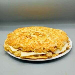 Tortilla rellena de champiñones y queso