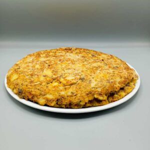 Tortilla de patatas con puerro,zanahoria y gambas